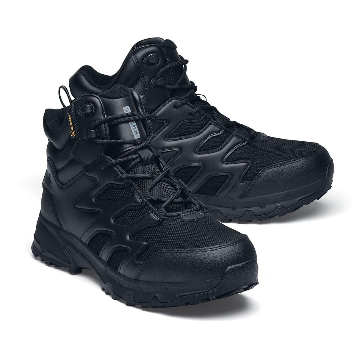 The Shoes for Crews Carrig Mid is a slip-resistant safety boot with a waterproof upper, pair seen in the right profile with the tip of the right shoe emphasised.