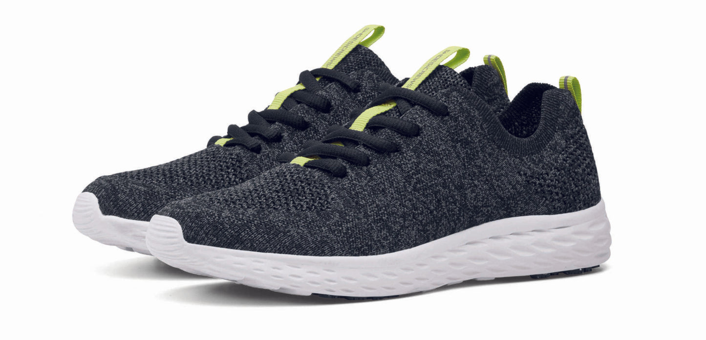 The Everlight™ ECO Womens Black/Grey from Shoes For Crews are lightweight, breathable slip-resistant trainers made from recycled materials, pair seen in profile on the left.