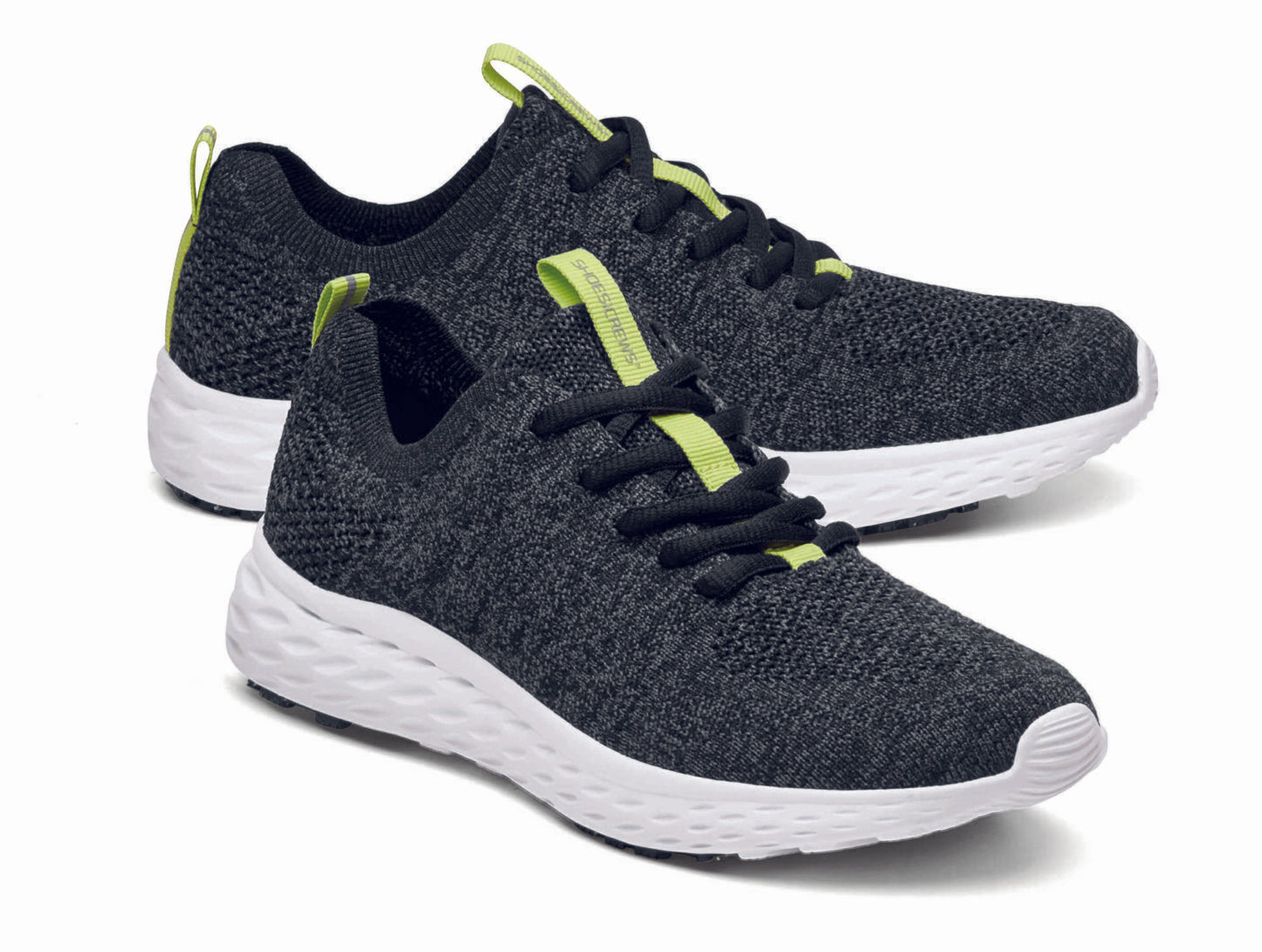 The Everlight™ ECO Womens Black/Grey from Shoes For Crews are lightweight, breathable slip-resistant trainers made from recycled materials, pair seen from the right side, emphasised on the tip of the right shoe.