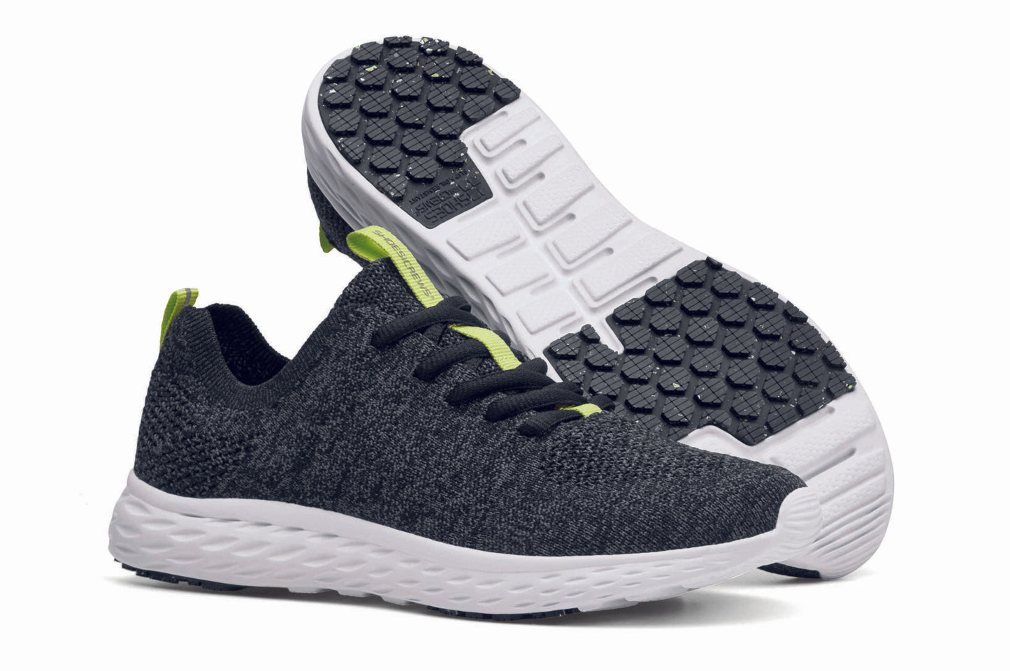 The Everlight™ ECO Womens Black/Grey from Shoes For Crews are lightweight, breathable slip-resistant trainers made from recycled materials, pair seen from the right side and the sole.