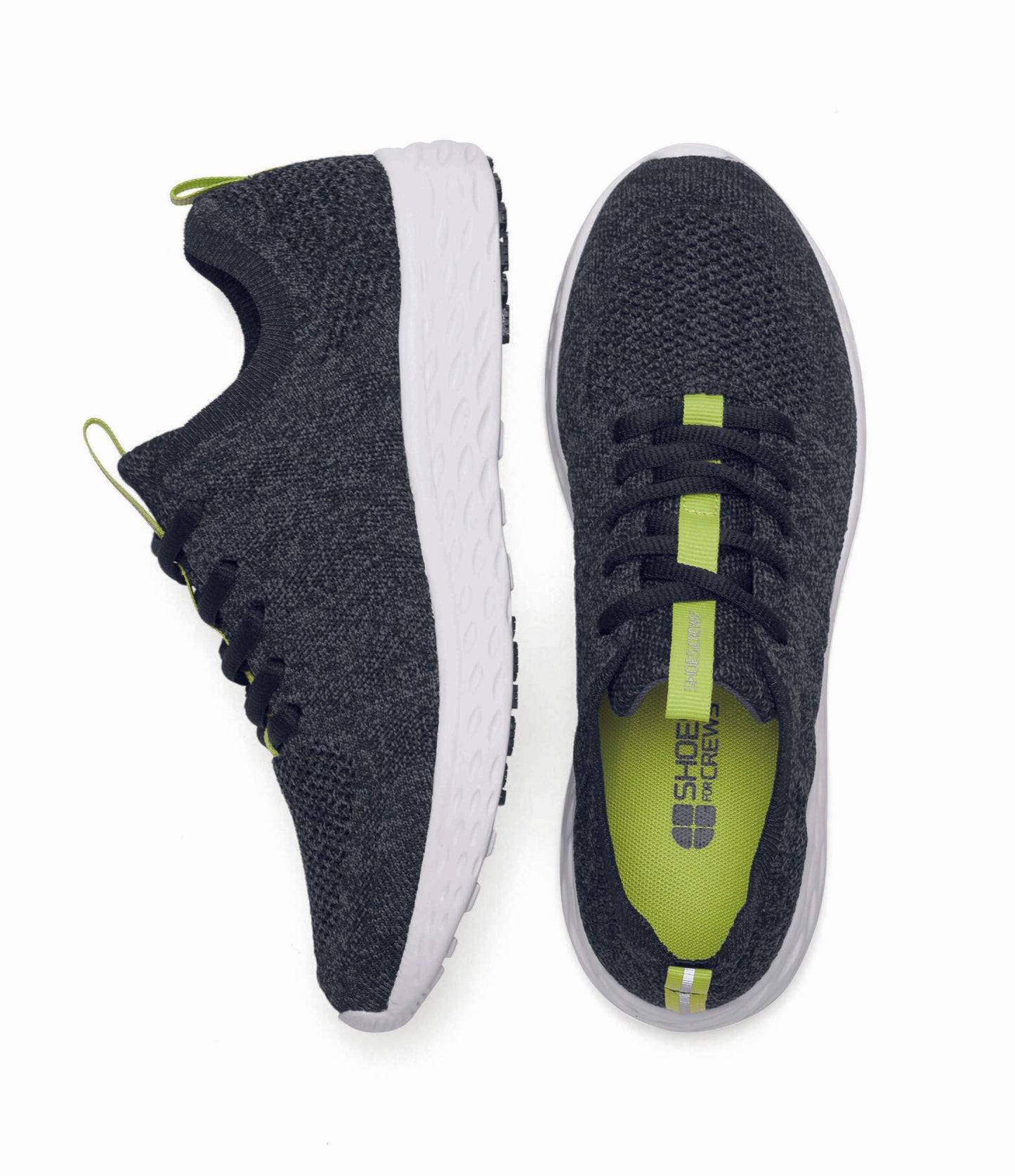 The Everlight™ ECO Womens Black/Grey from Shoes For Crews are lightweight, breathable slip-resistant trainers made from recycled materials, viewed from the side and bottom at a vertical angle.