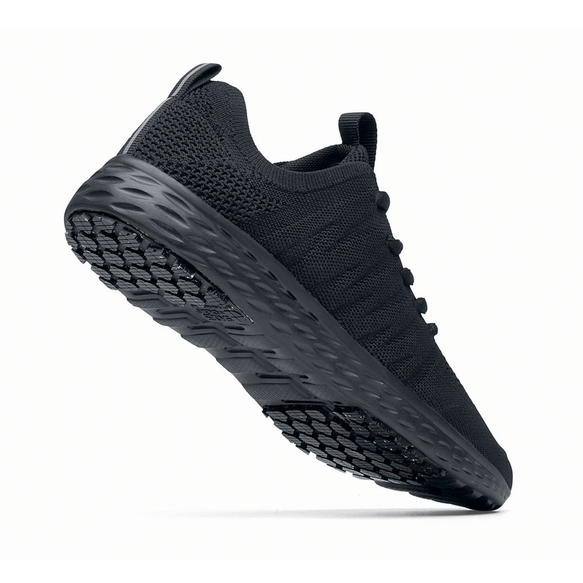 The Everlight™ Eco Men's Black from Shoes For Crews are slip-resistant trainers built with a recycled mesh upper that is water-resistant and breathable. Designed to keep your feet cool and ventilated, seen from the perpendicular.