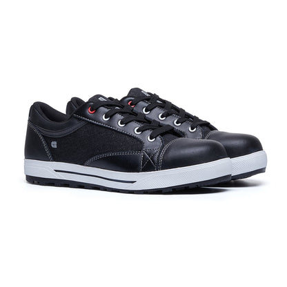 The Fergus Denim from Shoes For Crews is an slip-resistant safety shoe with a waterproof leather upper and a nanocomposite toe cap (200 joules), pair seen in profile on the right.