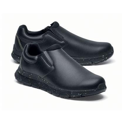 The Shoes for Crews Cater Eco Men's Black is a sustainable, slip-resistant safety shoe, pair seen from the right side, emphasised on the tip of the right shoe.