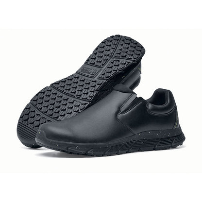 The Shoes for Crews Cater Eco Men's Black is a sustainable, slip-resistant safety shoe, pair seen from the left side and sole.