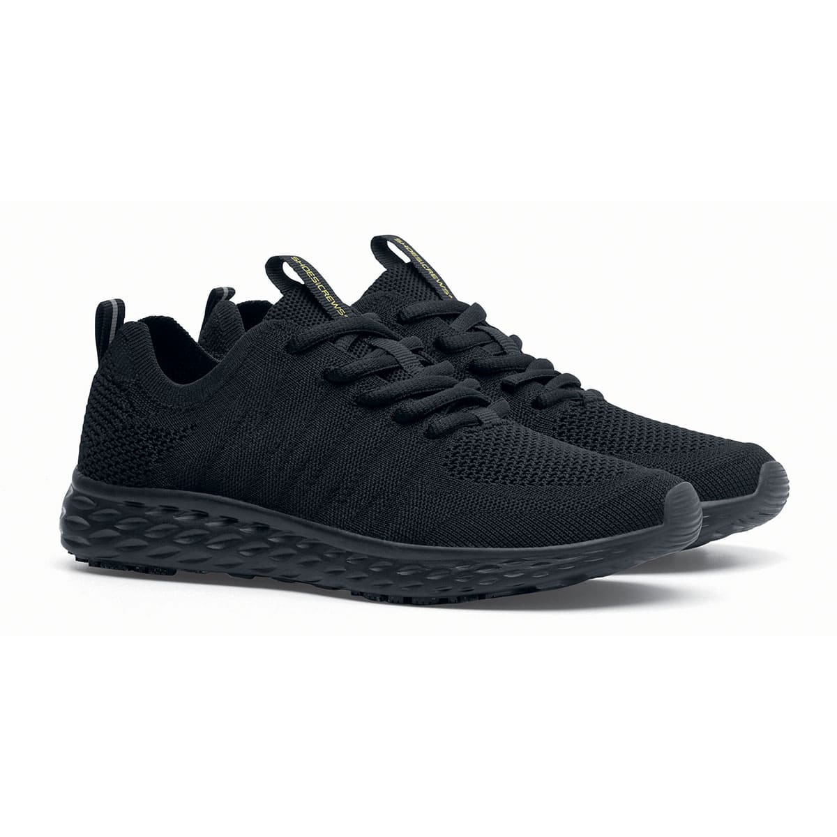 The Everlight™ Everlight Eco Women's Black from Shoes For Crews are lightweight and breathable slip-resistant trainers made from recycled materials, pair seen in profile on the right.