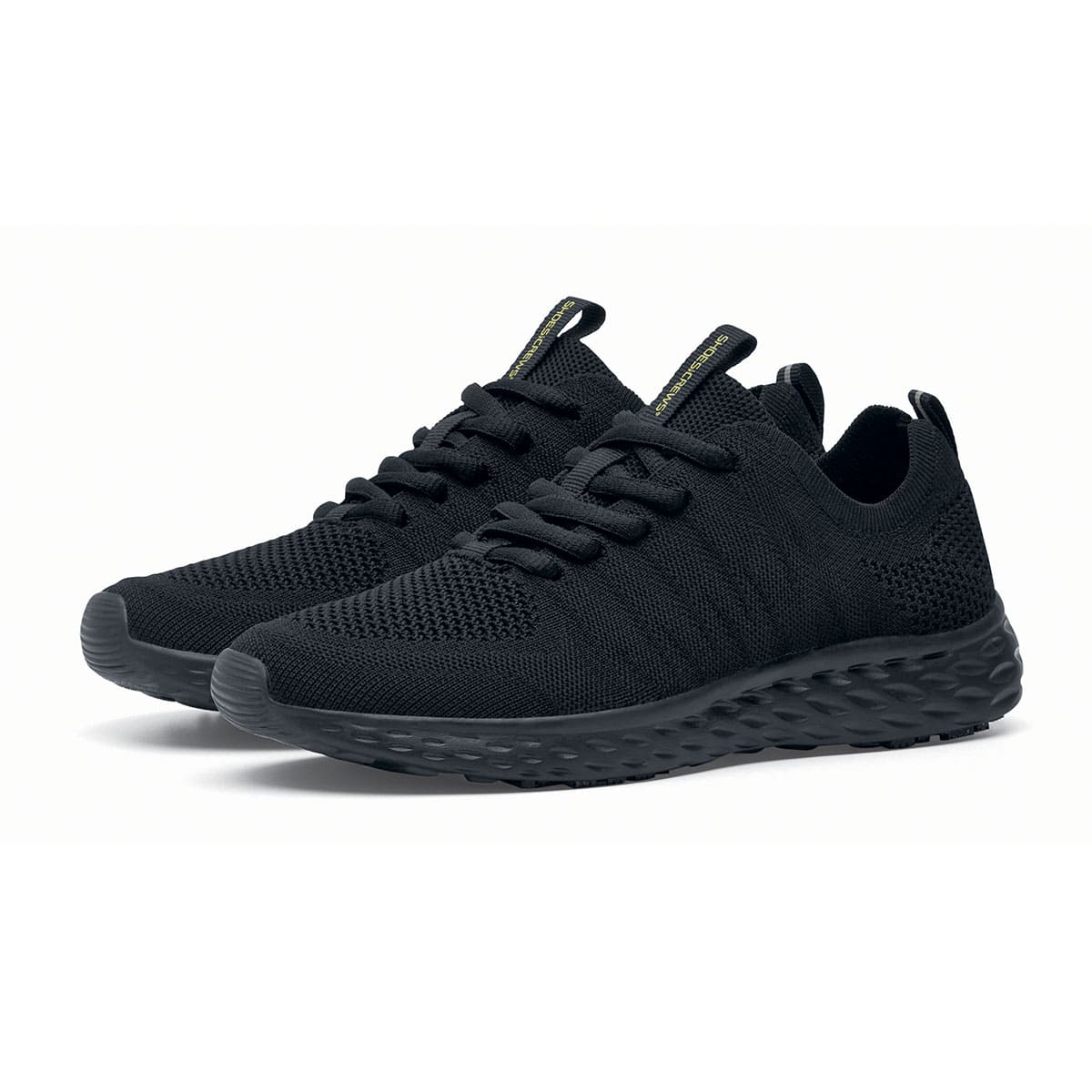 The Everlight™ Everlight Eco Women's Black from Shoes For Crews are lightweight and breathable slip-resistant trainers made from recycled materials, pair seen in profile on the left.