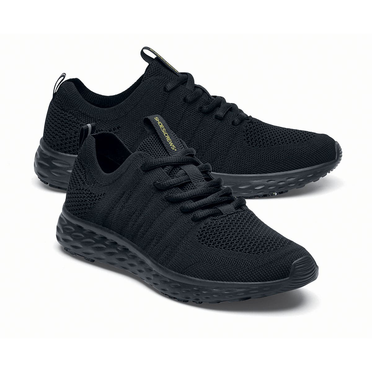 The Everlight™ Everlight Eco Women's Black from Shoes For Crews are lightweight and breathable slip-resistant trainers made from recycled materials, pair seen from the right side, emphasised on the tip of the right  shoe.