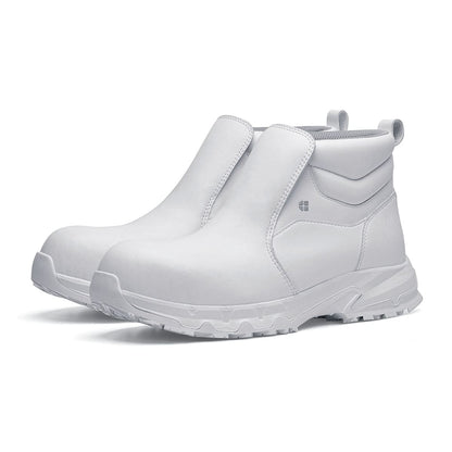 The Inny from Shoes For Crews is a safety shoe with a slip-resistant, clog-resistant upper sole and our advanced TripGuard technology, pair seen in profile on the left.