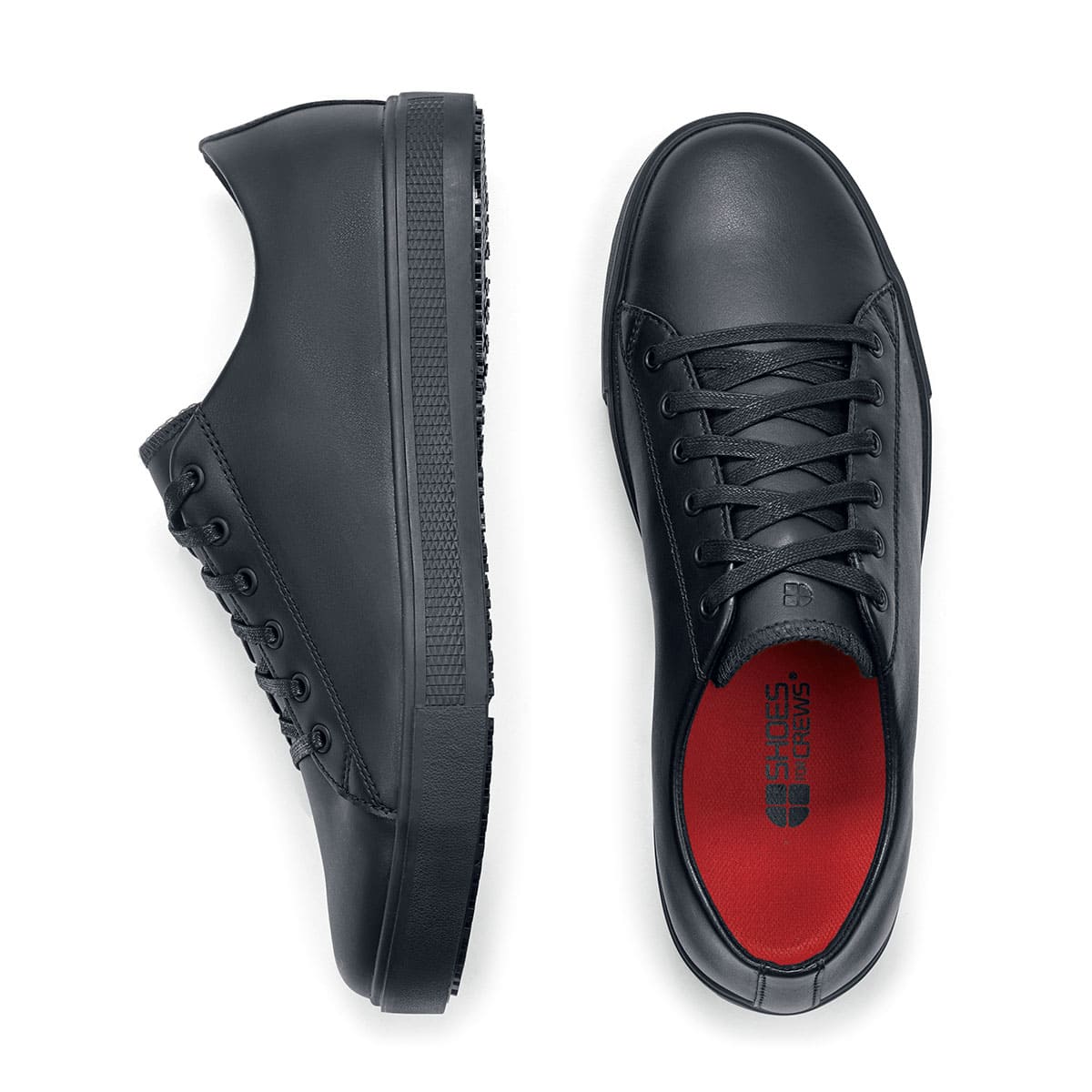 The Old School Low-Rider Black Gladiator Outsole from Shoes For Crews is a slip resistant lace-up shoe designed to provide comfort throughout the day, viewed vertically from above and from the side.