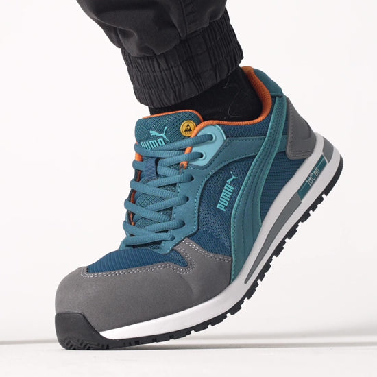 The Frontside Blue Low from Puma Safety X Shoes For Crews are slip-resistant safety shoes with a clog-resistant outsole and composite-fiberglass toe cap, product video.